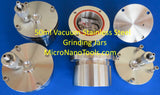 A set of Four Vacuum Stainless Steel Grinding Jars Inclu. Balls